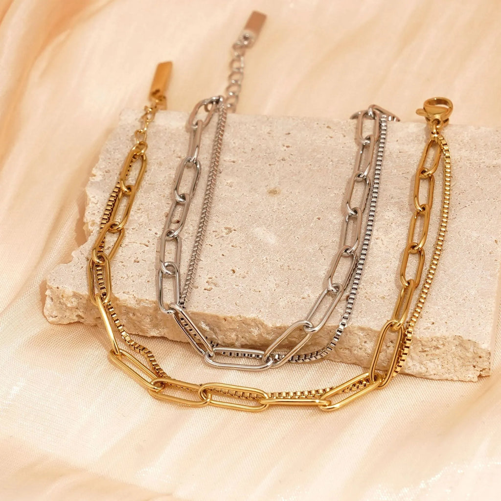 Geometric women's bracelet with twin titanium steel double-layer construction in gold or silver finish