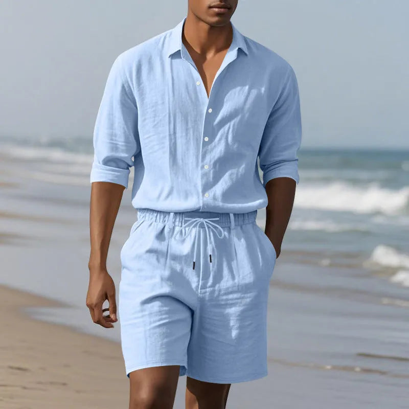 Men's linen beach suit set showing long sleeve shirt and matching shorts in light blue colour