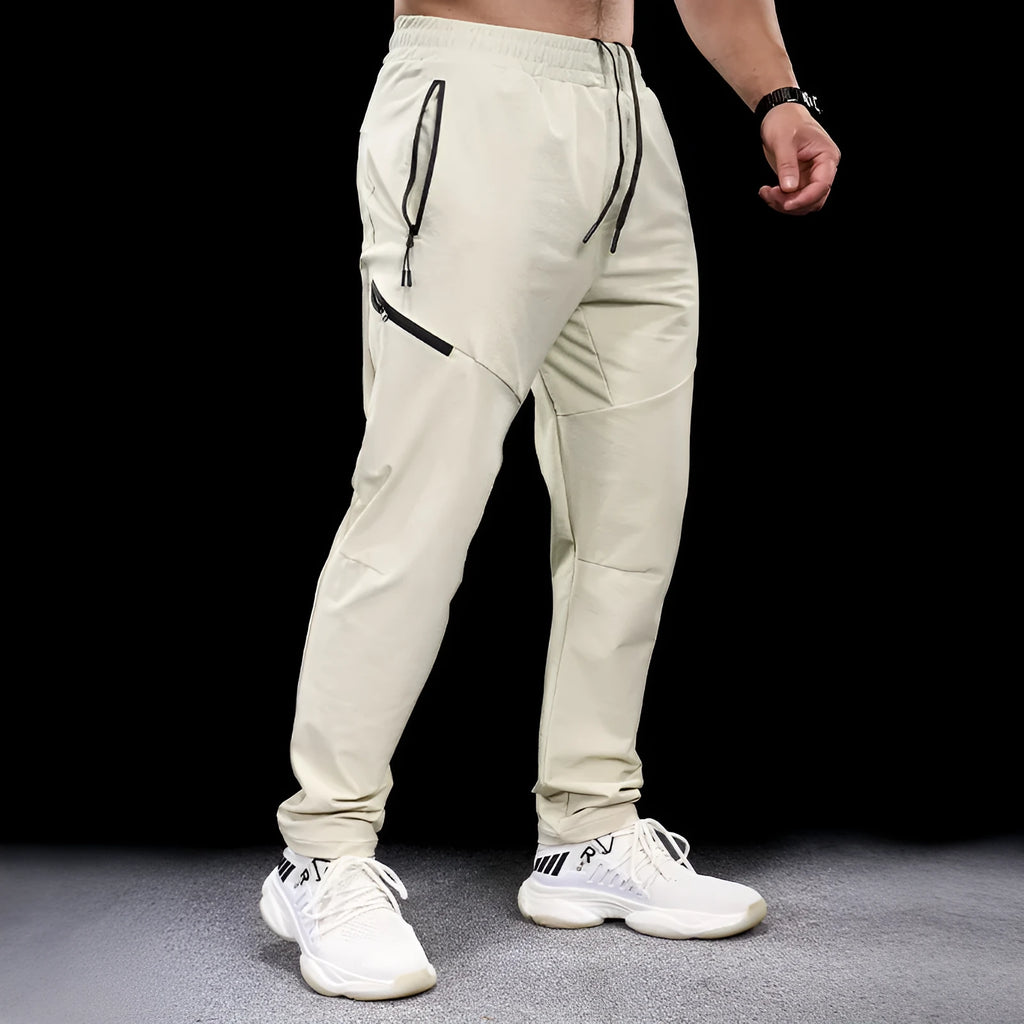 Men's waterproof quick-dry exercise pants in nylon fabric for sports and fitness activities