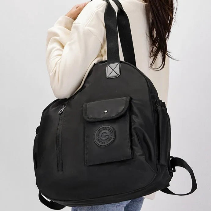 Large outdoor backpack with sandwich pocket organisation in black, khaki, or green