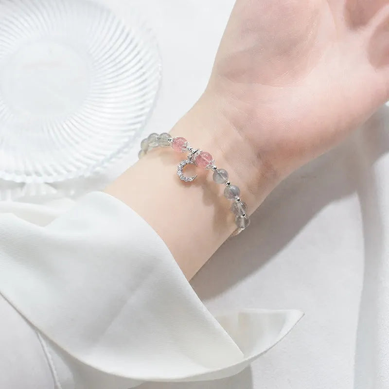 Moonstone bracelet with crescent moon charm on adjustable extension chain
