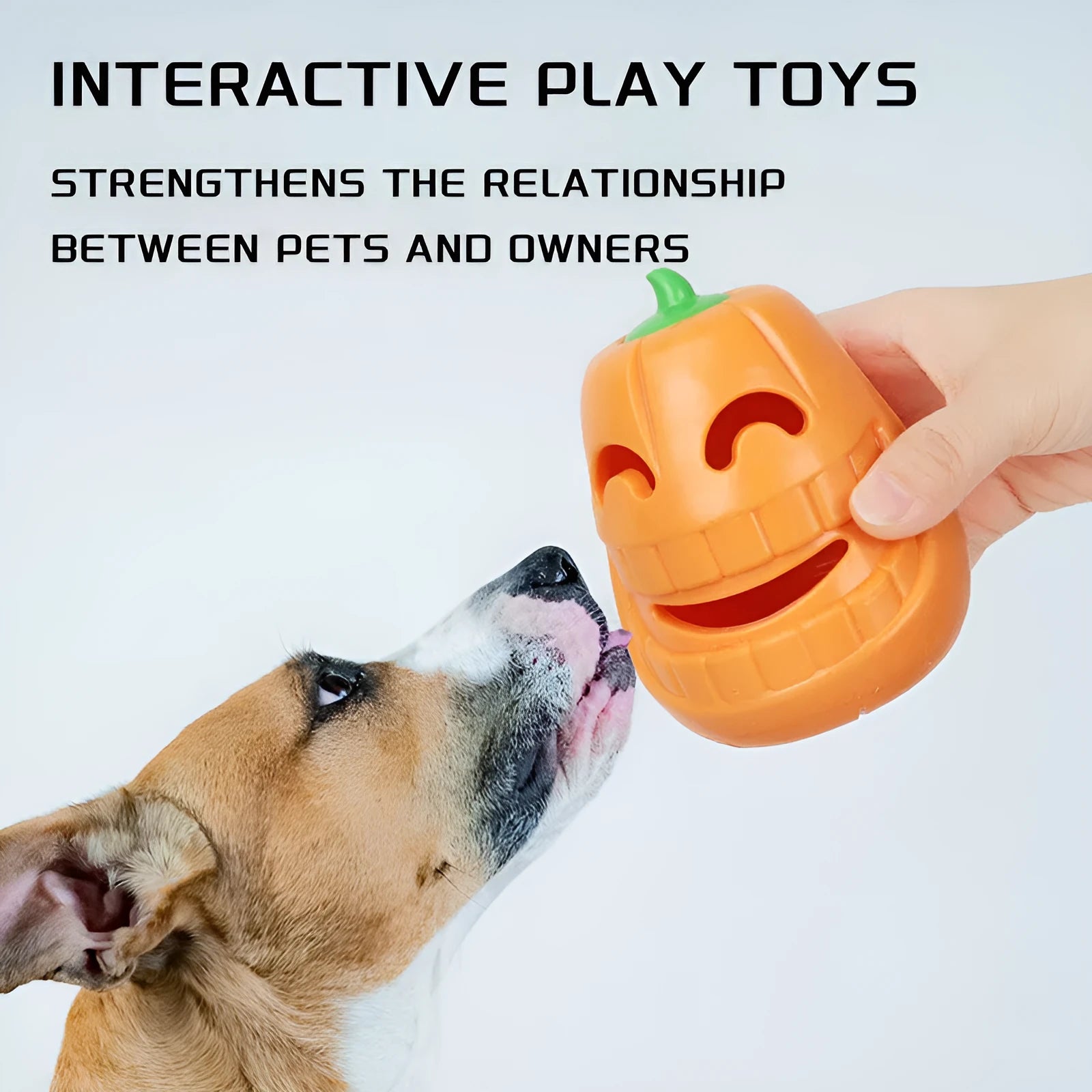 Halloween pumpkin shaped interactive dog chew toy with treat dispensing funnel