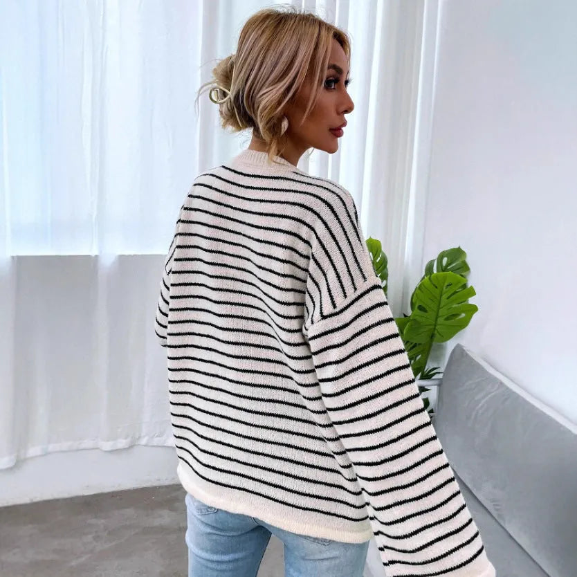 Black and white striped women's casual top with drop-shoulder sleeves and loose fit