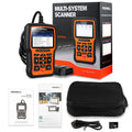 Foxwell NT510 orange and black automotive diagnostic scanner with data cable on workbench