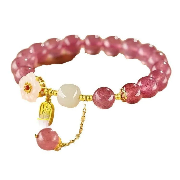 Handcrafted strawberry quartz crystal bracelet with Hetian jade peach blossom design for women