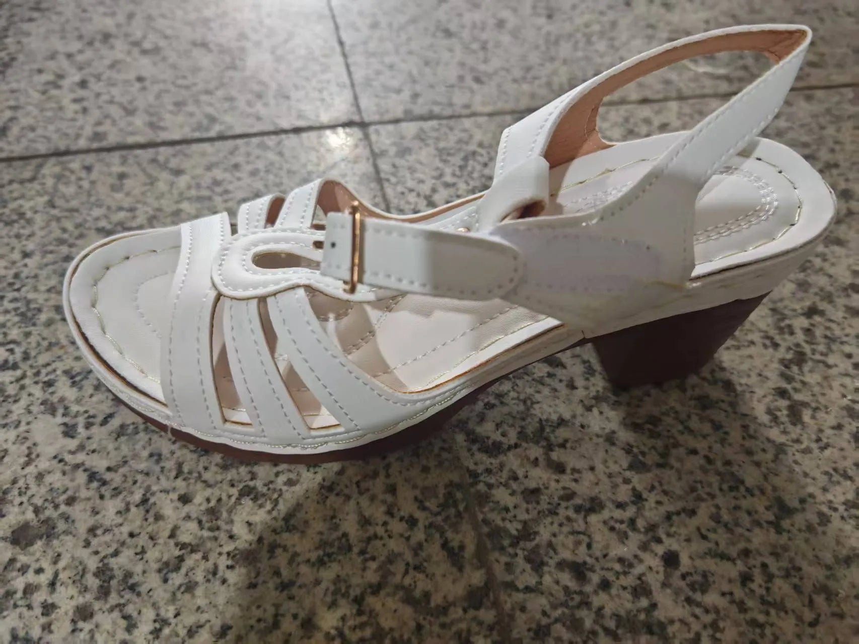 Women's black PU peep toe wedge sandals with an adjustable buckle strap.