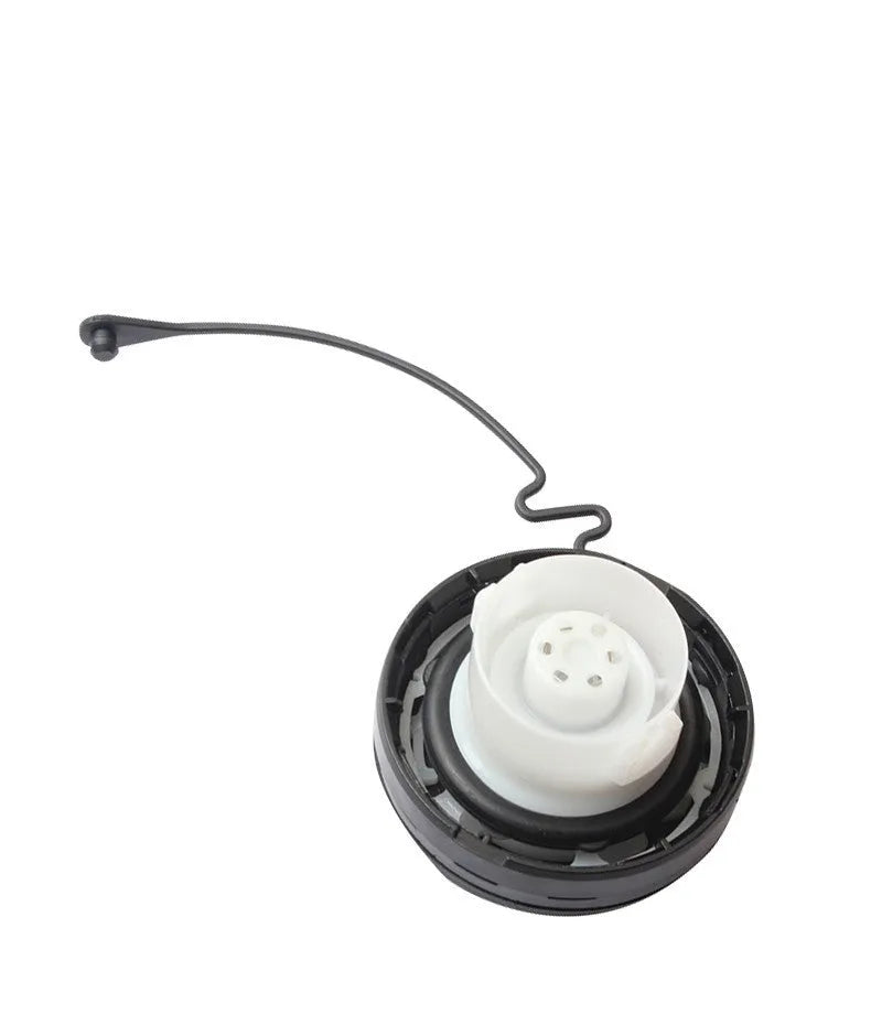Black plastic Toyota fuel tank cap with snap-type fitting mechanism
