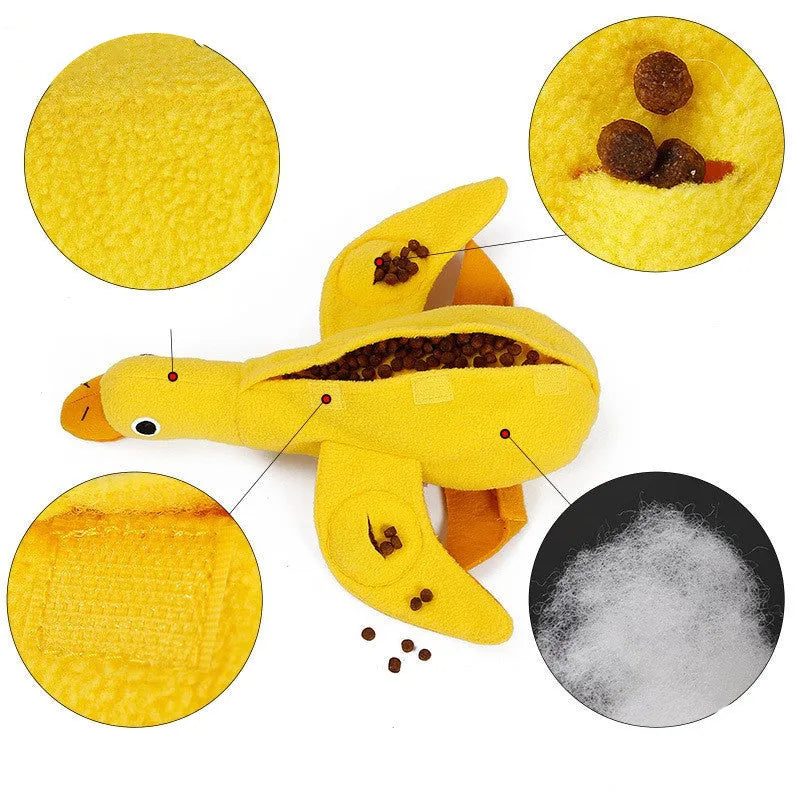 Yellow teddy fabric duck-shaped dog toy with squeaker and hidden food compartment