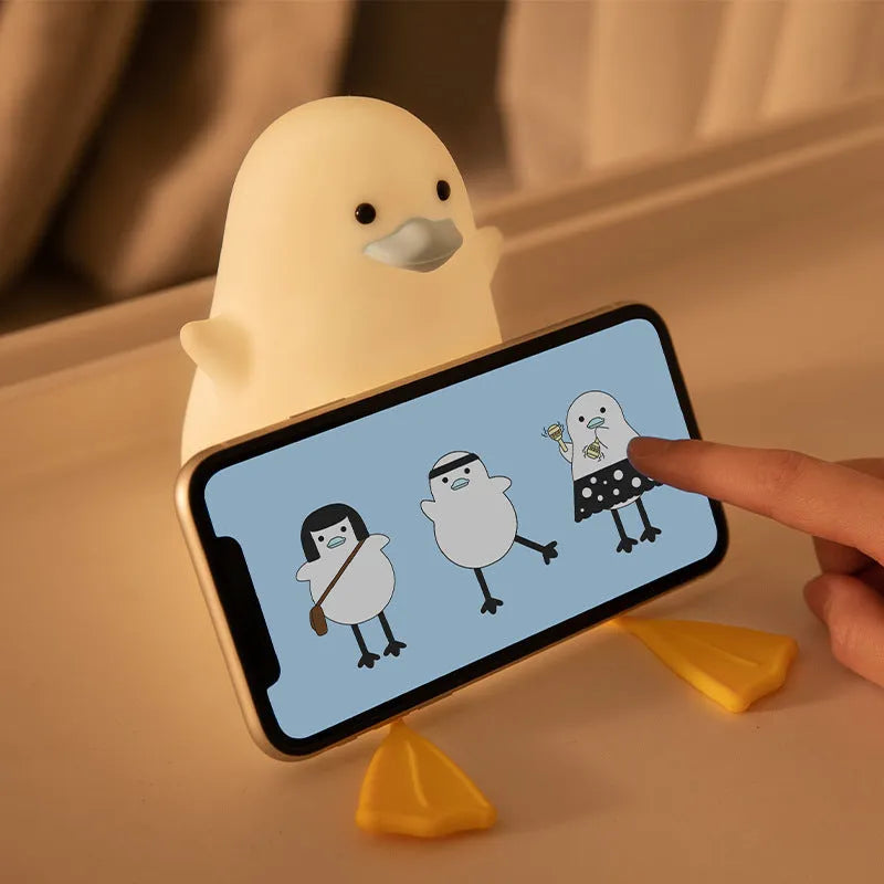 Seagull silicone night light in yellow with soft warm glow, compact size fits nursery bedside