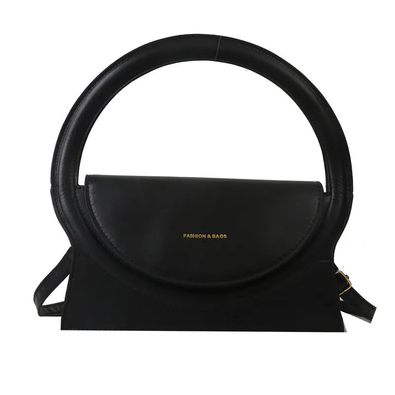 Horizontal square messenger bag in PU leather with sandwich pocket and stitching details
