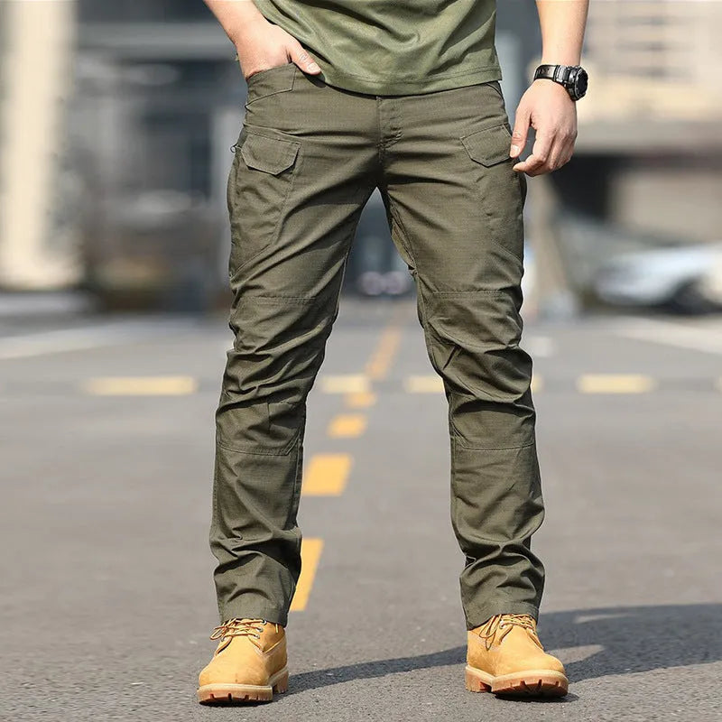 Men's solid colour training pants in khaki, made from chemical fibre blending fabric, designed for hiking and camping