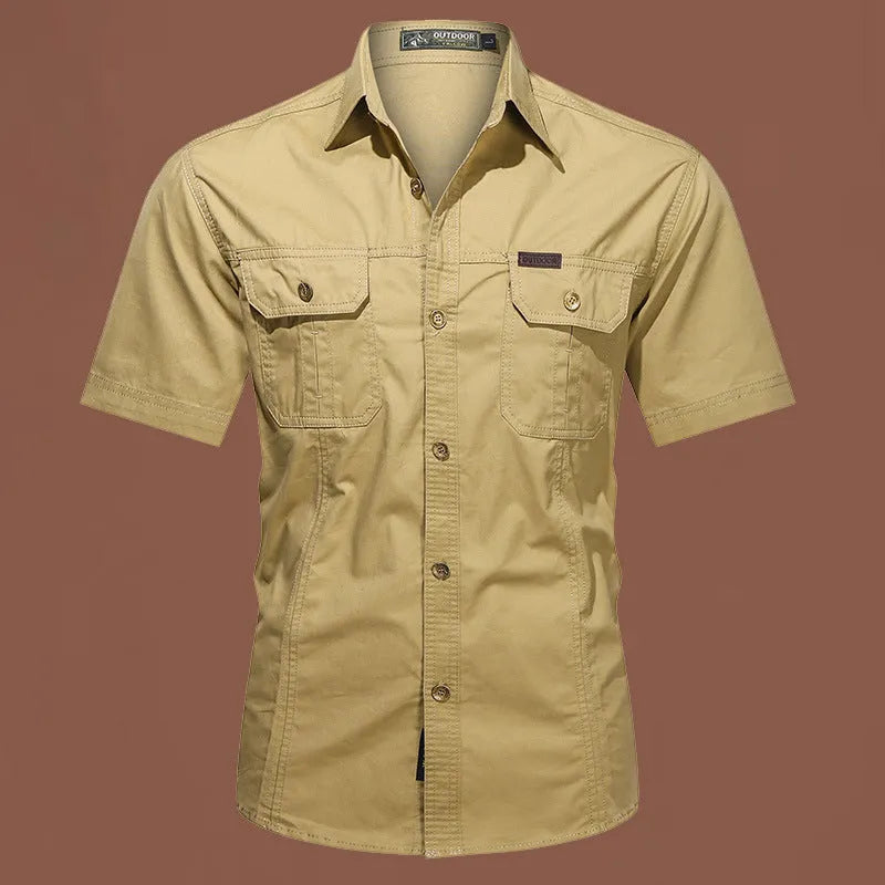 Men's army green cotton short sleeve work shirt with a loose fit and non-iron finish.