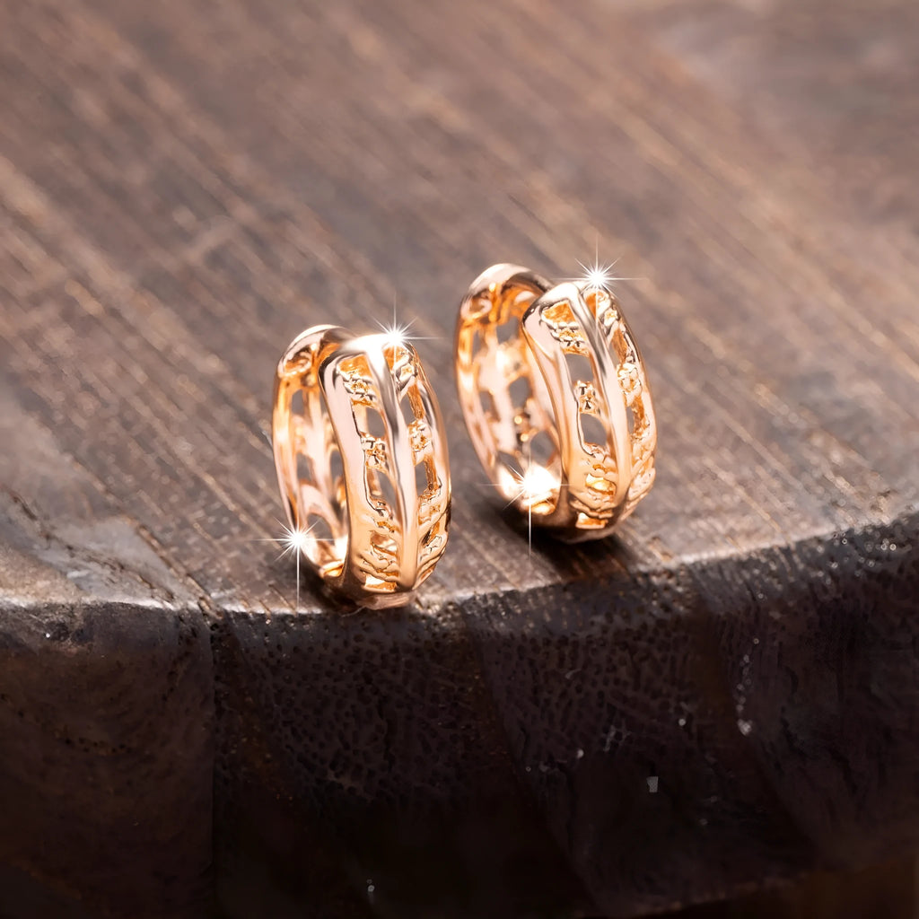 Rose gold leaf-shaped earrings with heart cut-outs, 20mm copper jewellery