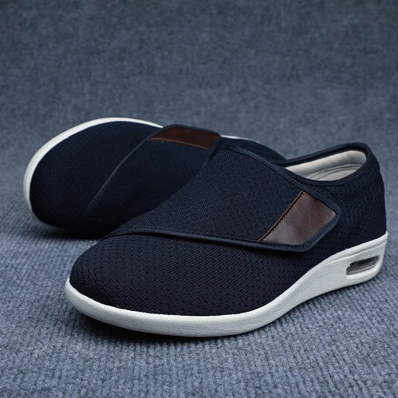 Beige leisure shoes with velcro strap closure and a round toe on a foam rubber sole.