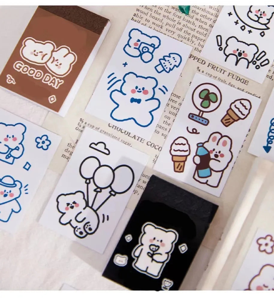 Fifty decorative sticker sheets in Japanese composite paper with cute animal and beverage designs measuring 40x60mm each