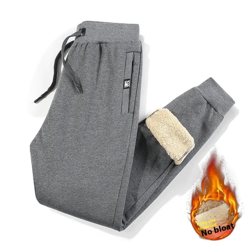 Men's grey fleece-lined cotton track pants with elastic waist and straight leg style