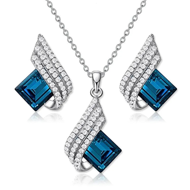 Women's necklace and earring set with glass pendant on cross chain, alloy material with electroplated finish