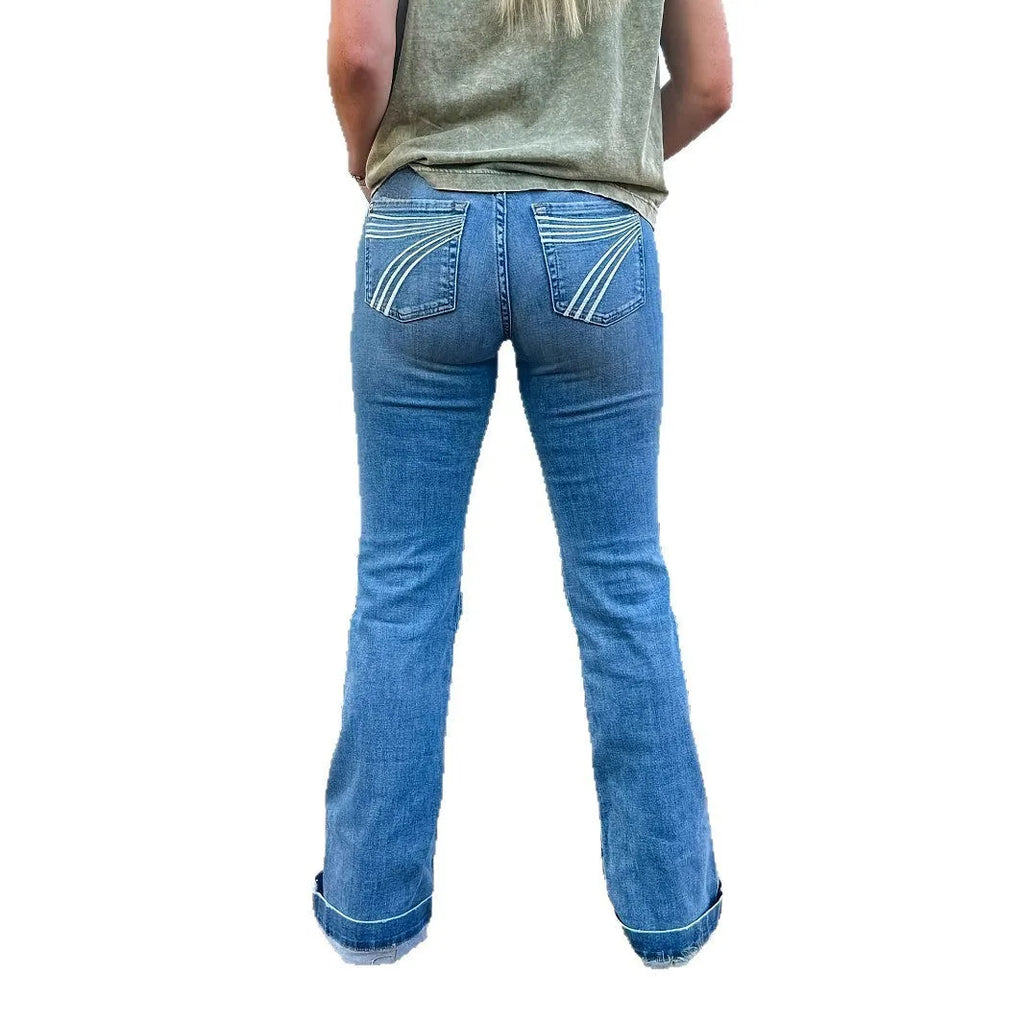 Slim fit mid-waist jeans with slight flare and embroidery details on blue denim