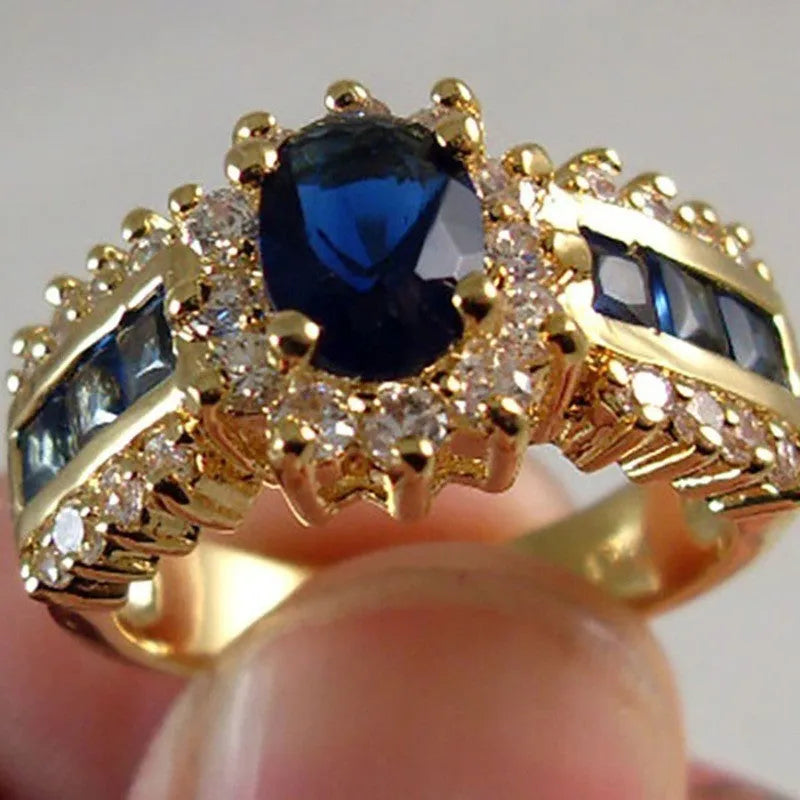 Personalised sunflower blue diamond and square cut blue or purple zircon rings for men and women.