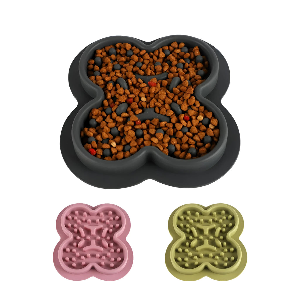 Silicone pet licking mat slow feeder in blue on a kitchen floor