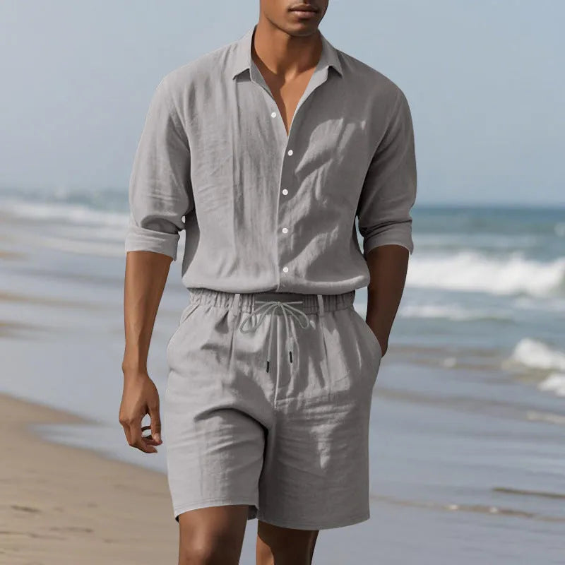 Men's linen beach suit set showing long sleeve shirt and matching shorts in light blue colour