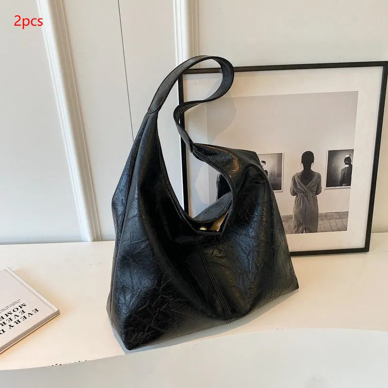 Soft PU leather shoulder bag with sandwich pockets in five colour options