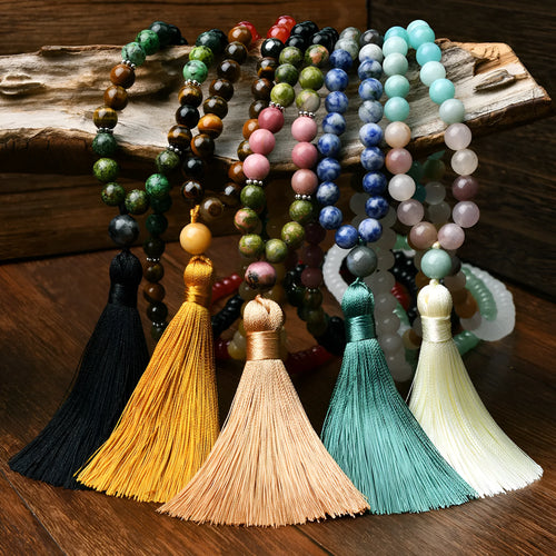 Long 108 natural stone bead necklace with mixed gemstone tassel pendant in bohemian style.