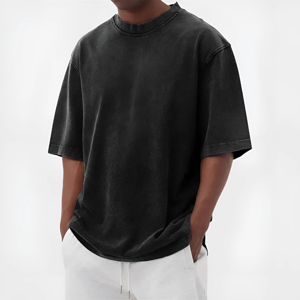 Men's loose fit distressed pullover T-shirt in solid colour options including blue, black, and army green
