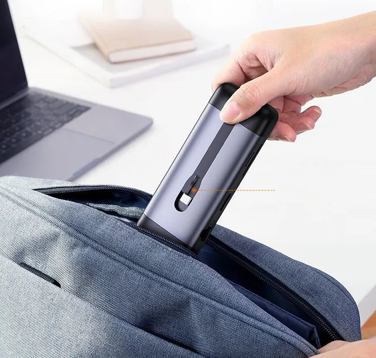 USB-C dock expansion adapter showing HDMI, USB 3.0, and Power Delivery ports with included cables