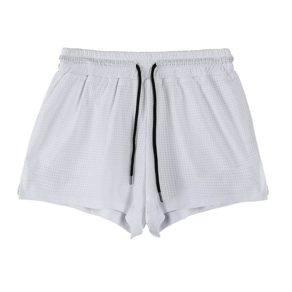 Men's quick-drying nylon shorts in black and white colours with mid waist fit