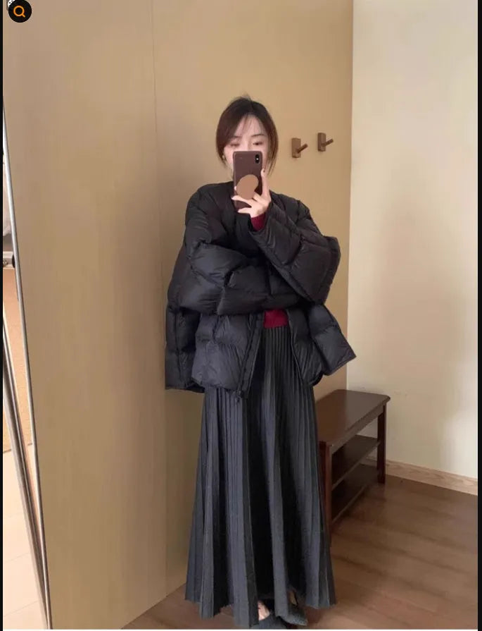 Women's dark grey knitted long dress suit set with 3D pattern, featuring a sweater and skirt in artistic retro style.