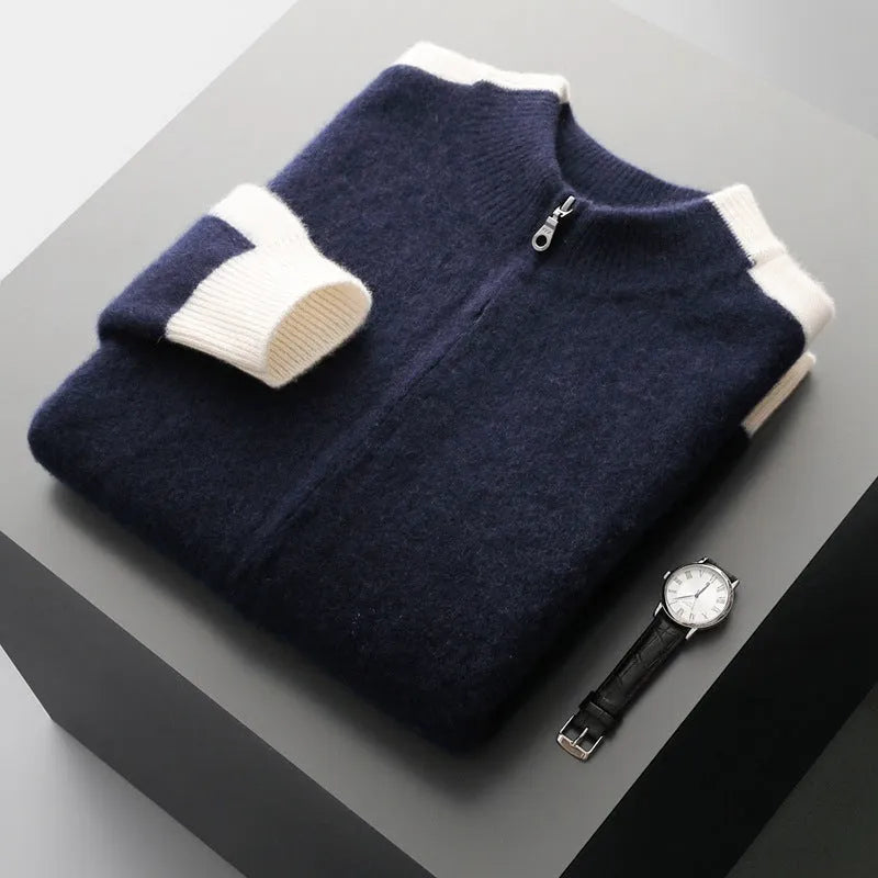 Man wearing a dark blue zip-up cardigan with a half turtleneck collar and thick wool fabric.