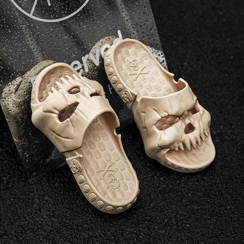 Khaki personalised skull design EVA slippers on a tiled floor, unisex Halloween flip-flops for indoor outdoor use