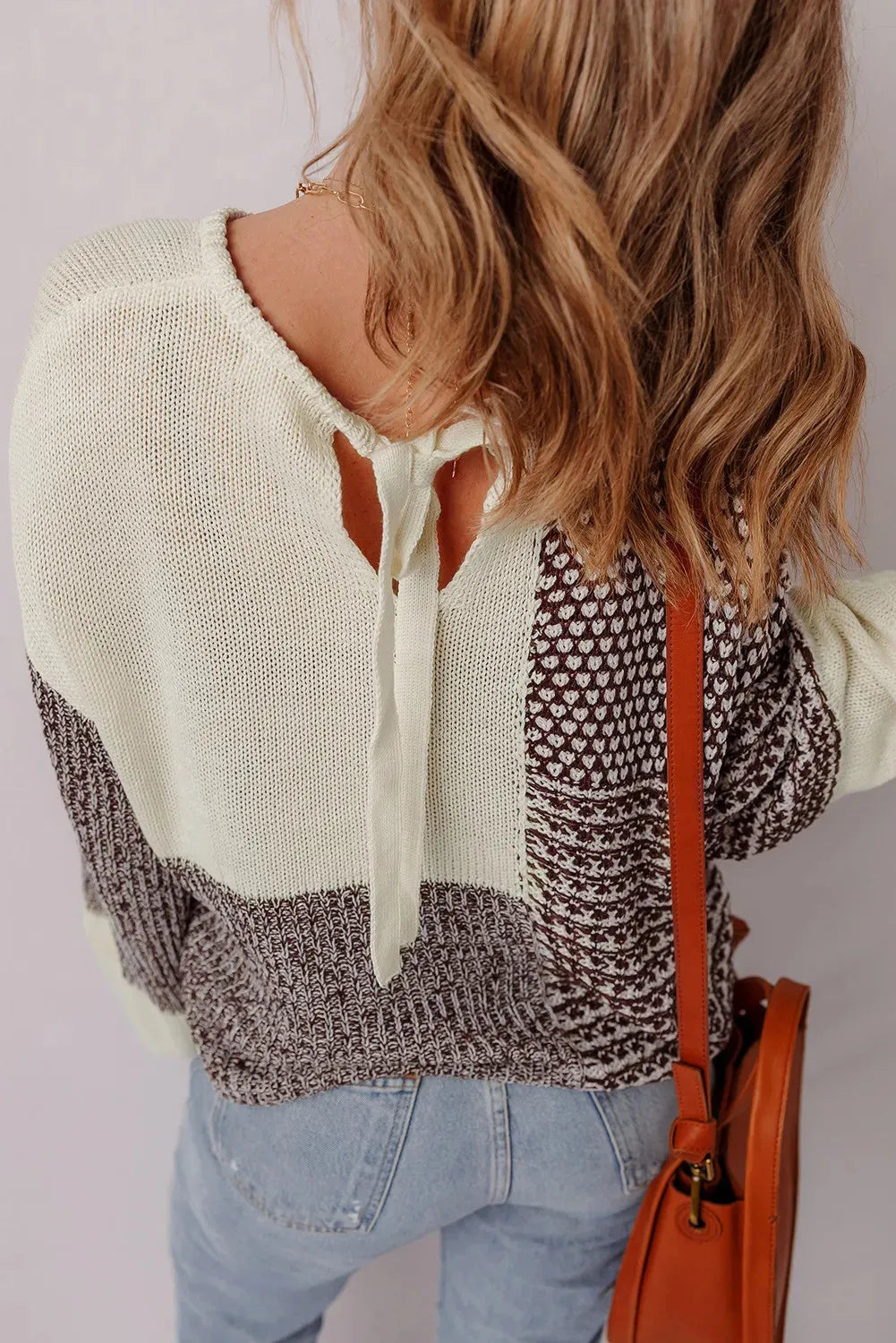 Dark khaki women's loose sweater with back tie and drop shoulders