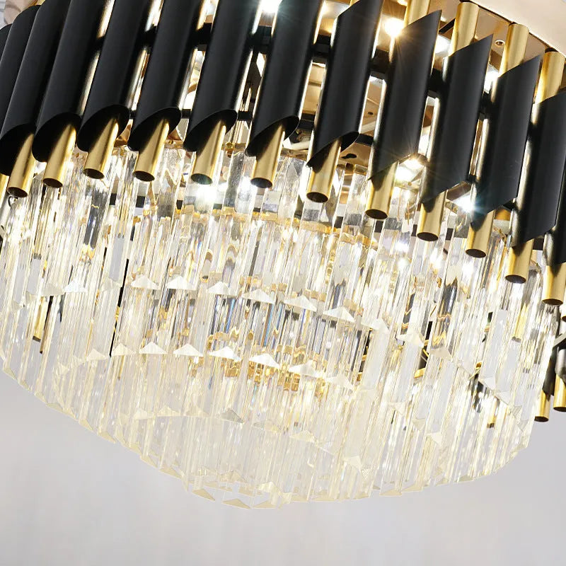 Crystal lampshade ceiling fan with light and remote control on a white ceiling.