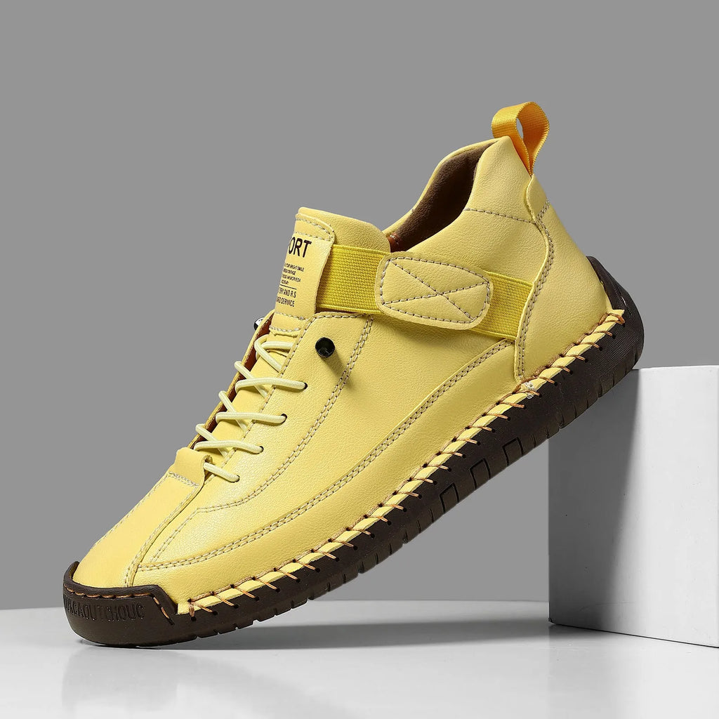 Men's mid-top Martin boot in khaki with visible stitching, on a flat rubber sole.