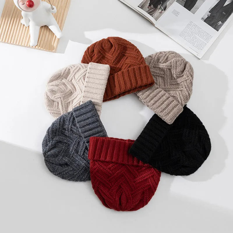 Women's wool knitted dome crown winter hat in six colour options including ivory white and ankela red