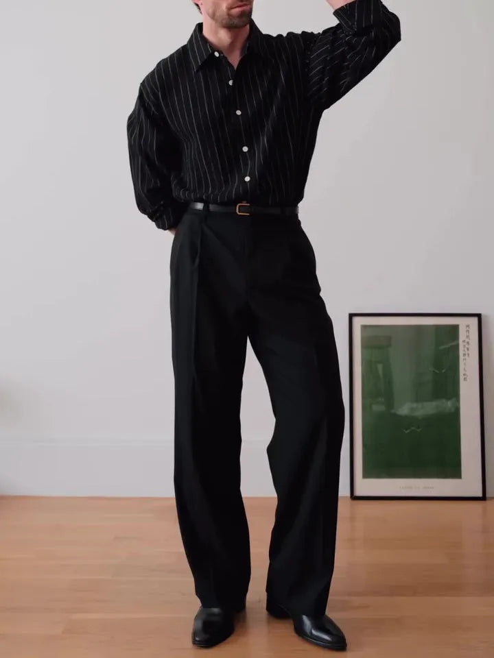 Black pinstriped polyester button-down shirt with collar, shown front view