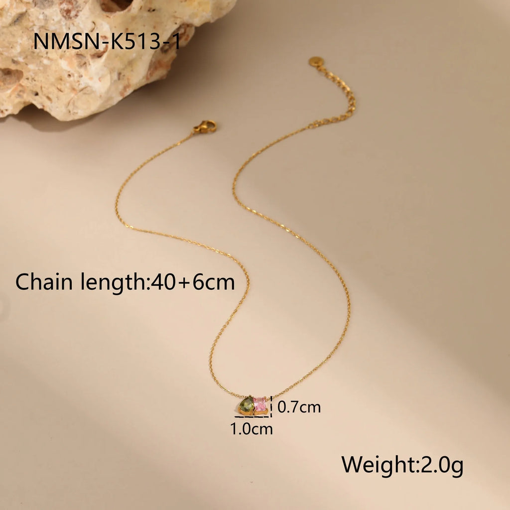 Geometric gold plated jewellery set showing necklace, ring and matching earrings with zircon detailing