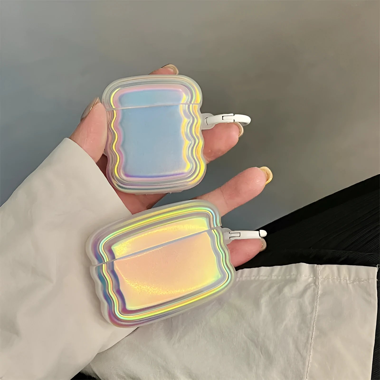 Silicone protective case for AirPods with a holographic magic laser and ring colour design.