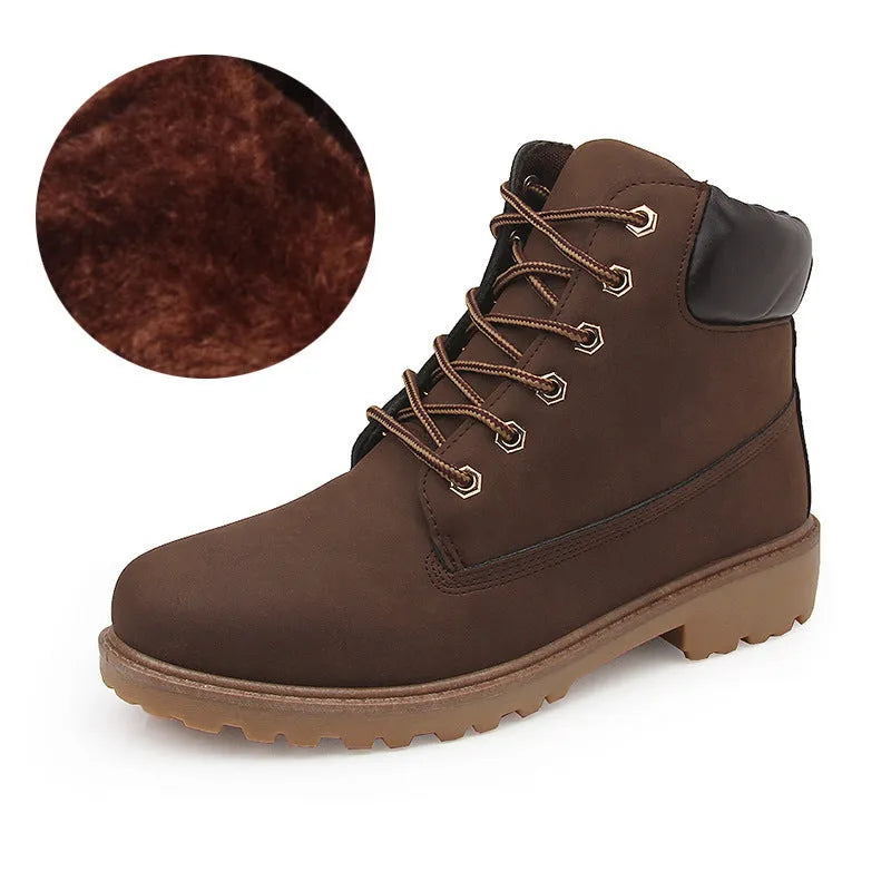Men's pink high-top Martin boots with round toe and front lace-up on a flat bottom.