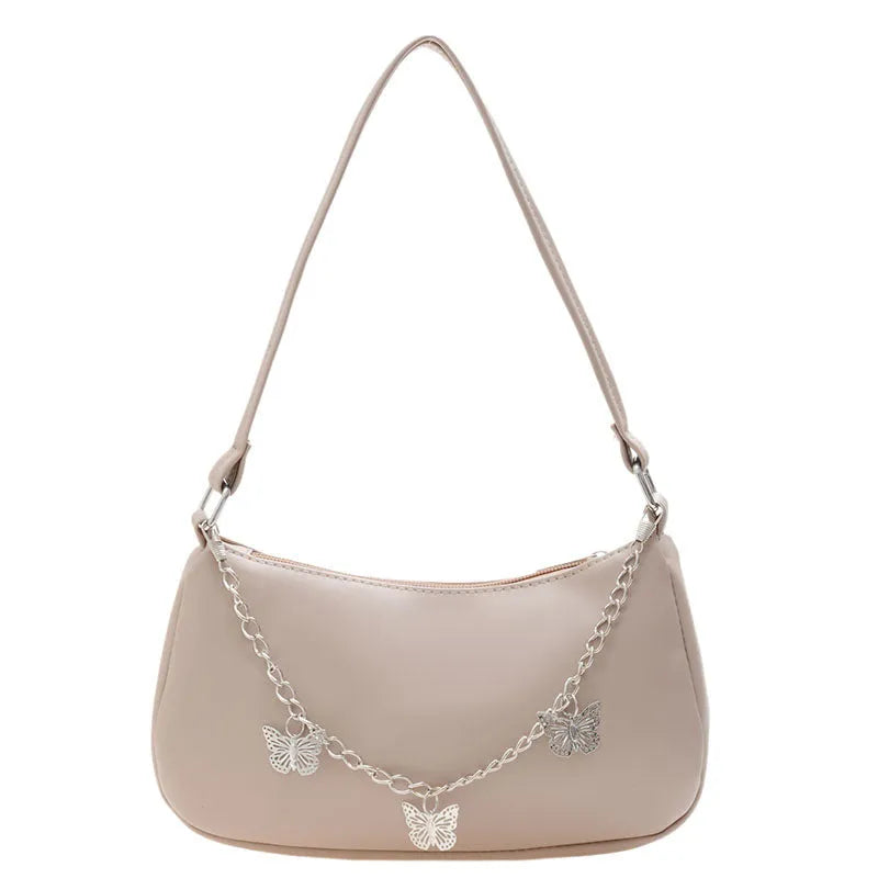Women's black butterfly chain underarm bag with retro styling and three-dimensional pocket