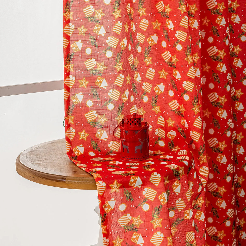 Red Christmas curtain with printed snowman and angel cartoon figures, 1 metre length