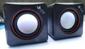 Black square USB-powered computer speaker for desktop PC audio enhancement
