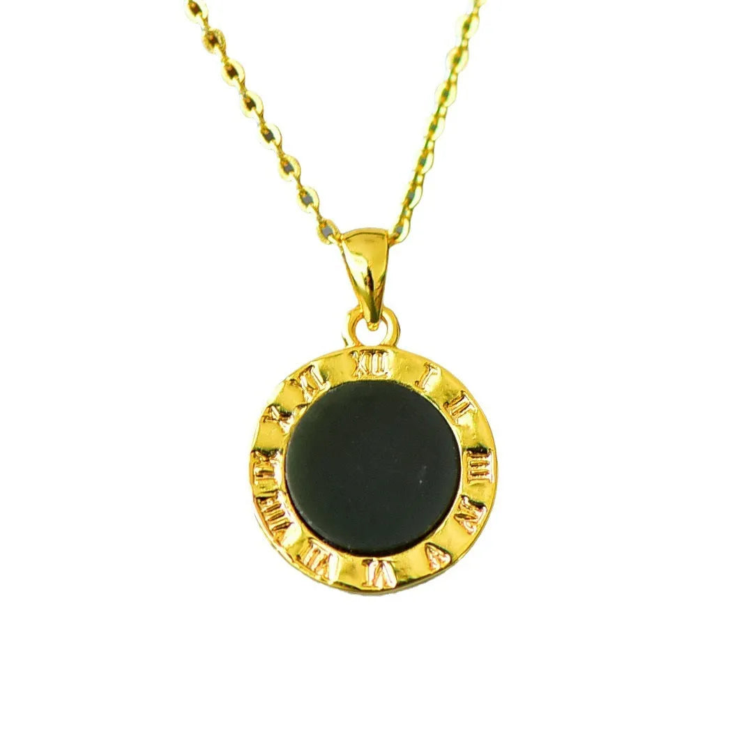 Flat, polished Hetian jade pendant in ink blue and gray, set within a handcrafted copper inlay on a necklace chain.