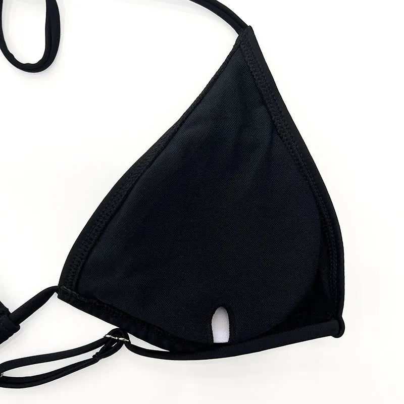 Black mesh women's bikini set with long sleeves, a four-piece swimsuit for swimming sports.