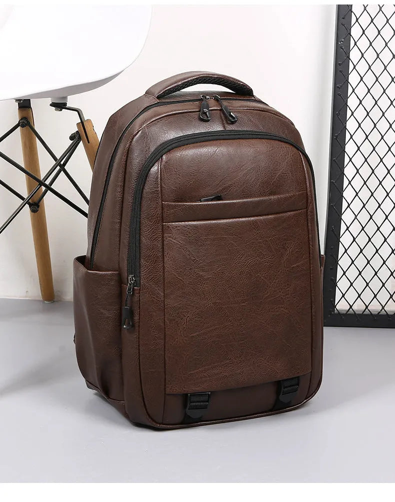 Men's large capacity leisure backpack in khaki, PU material, curved shoulder strap, 47x33x18cm