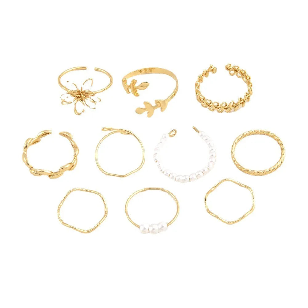 Openwork flower ring set with glossy gold finish and detailed floral pattern