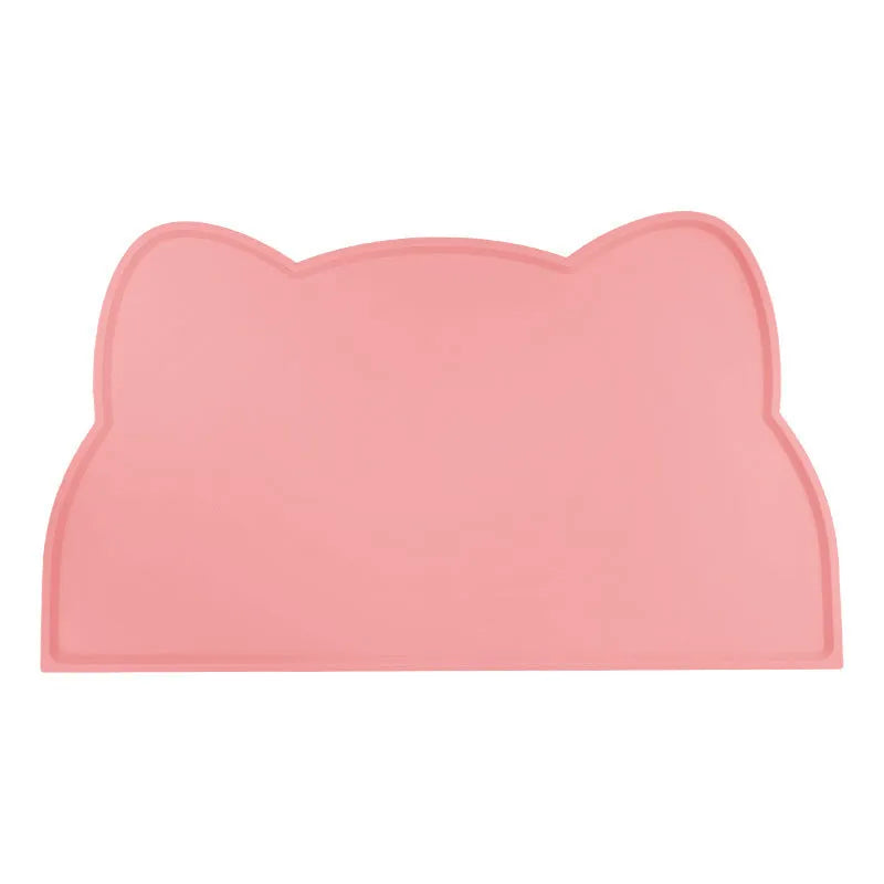 Silicone waterproof pet feeding mat with cat head design measuring 44x24cm in solid colours