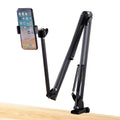 Black foldable metal desktop cantilever bracket with tablet clip extended to mounting position